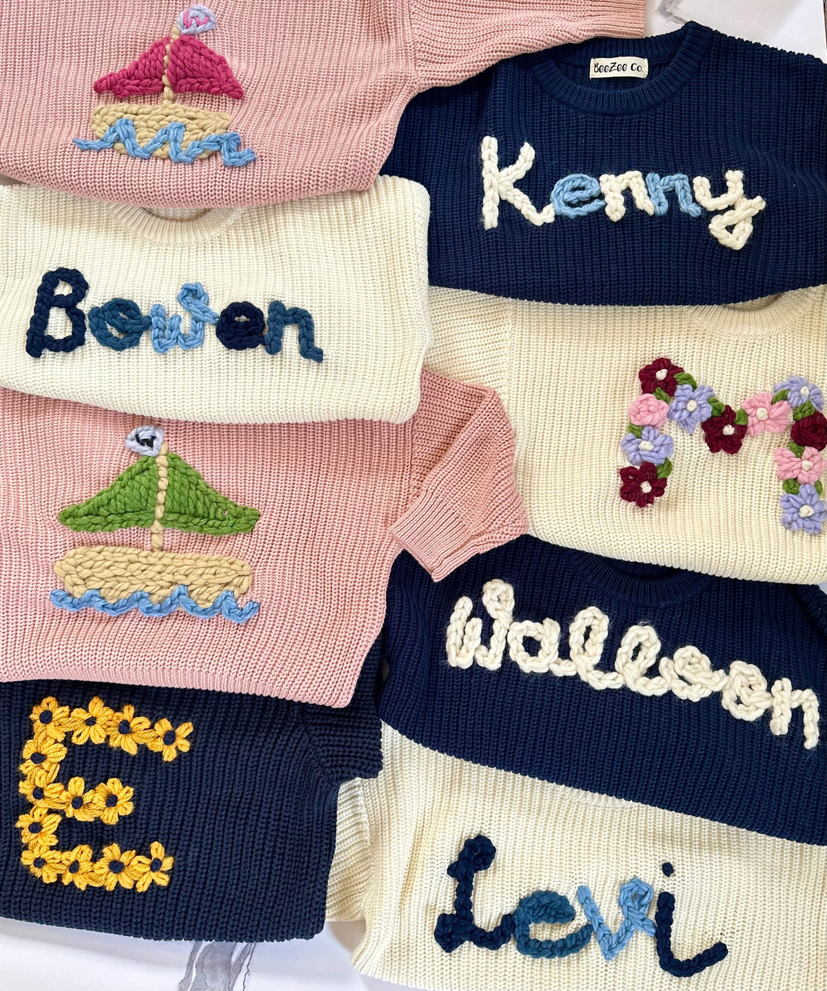 Custom baby sweater hand-embroidered by BeeZee