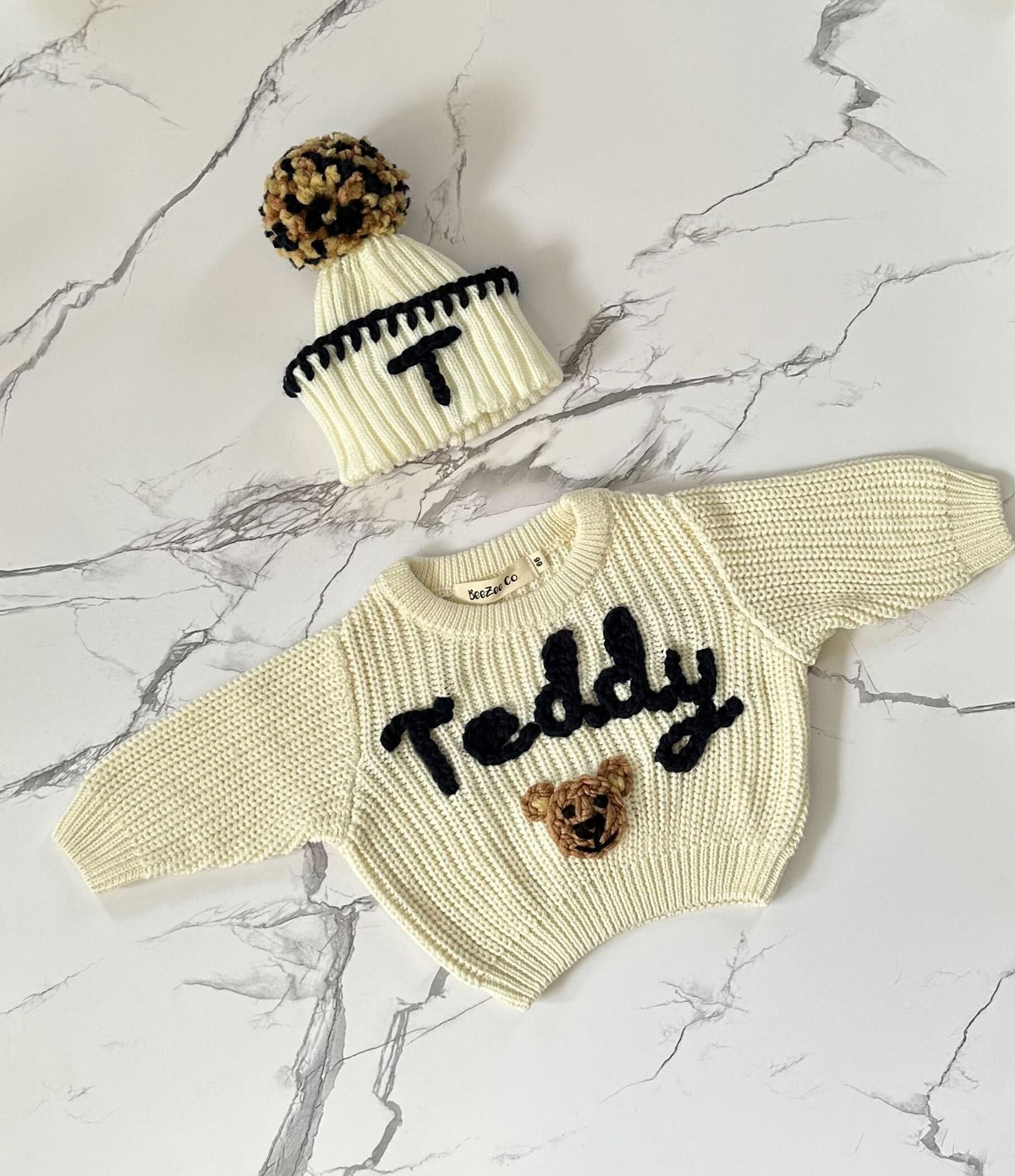 One-of-a-kind custom embroidered baby sweater by BeeZee