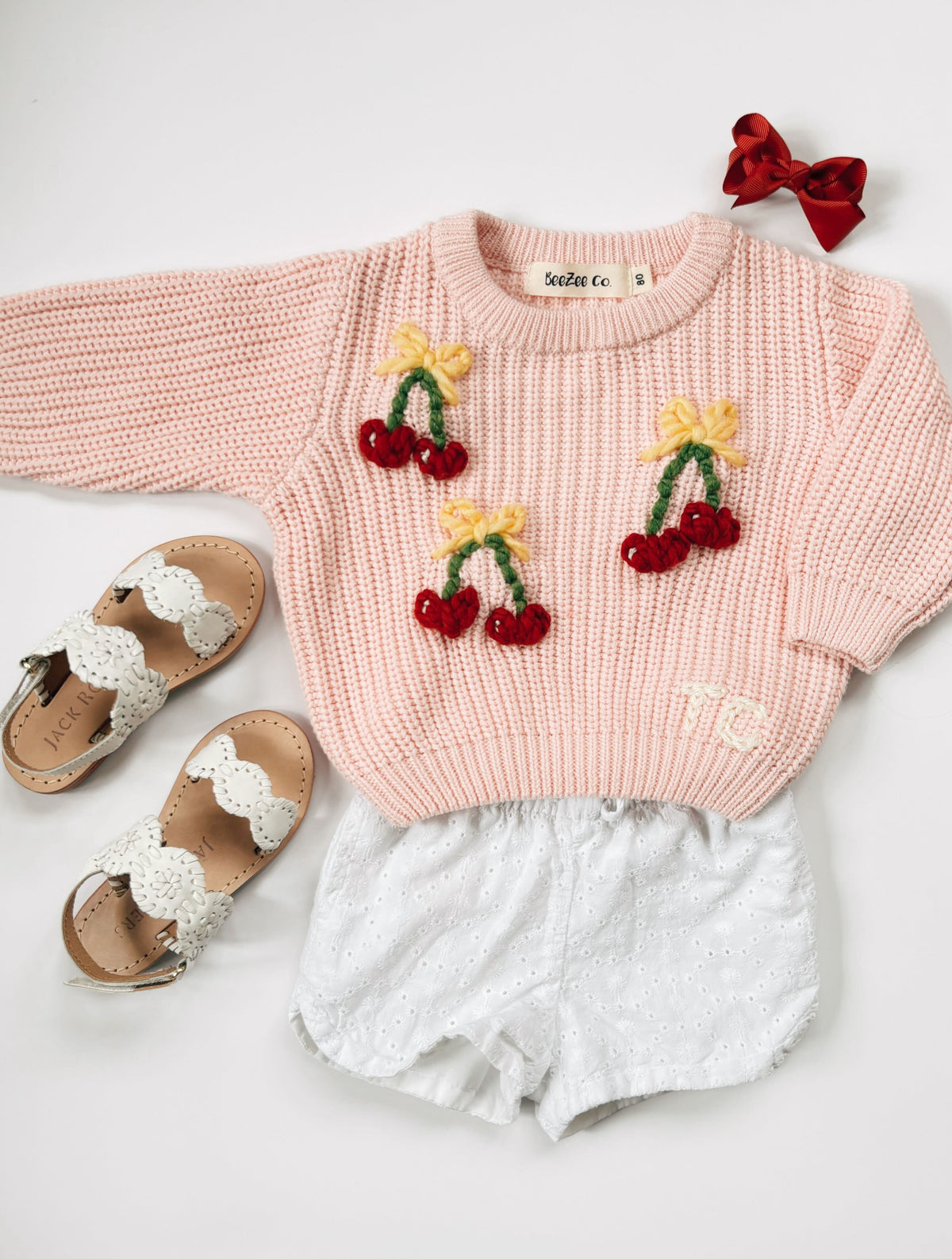 Custom hand-embroidered Traverse cherries sweater for kids